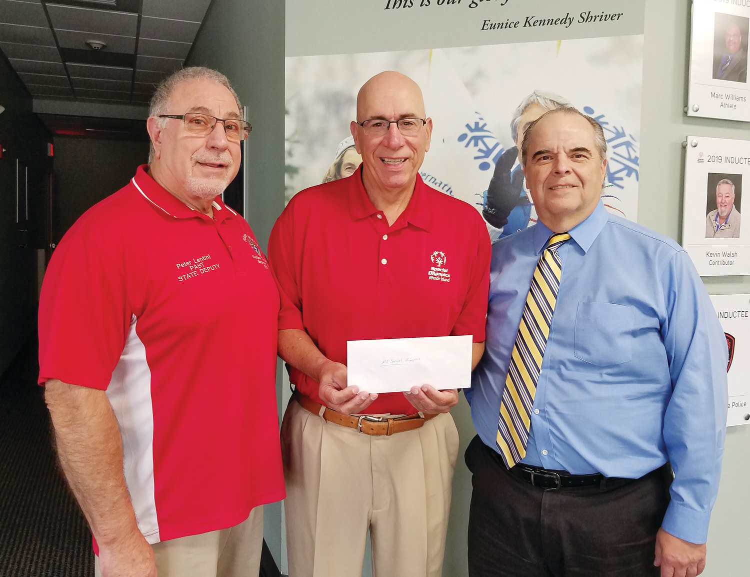 Knights with hearts of gold help Special Olympics: The East Providence Council 1528 Knights of Columbus presented an $1,100 donation to the R.I. Special Olympics Chief Executive Officer Dennis DeJesus. The check represented the proceeds from the council’s “Great Bowls of Fire” chili cook-off competition. Pictured from left, Peter Lentini, R.I. Knights of Columbus past State Deputy and R.I. Special Olympics board member, Dennis DeJesus, chief executive officer of the R.I. Special Olympics; and Steve Perry, Deputy Grand Knight of Council 1528.